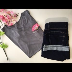 Gray blouse with a white sheer trim.